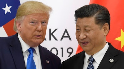 In this June 29, 2019, file photo, U.S. President Donald Trump poses for a photo with Chinese President Xi Jinping during a meeting on the sidelines of the G-20 summit in Osaka, western Japan.