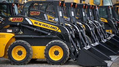 New Holland earth moving and construction equipment on a lot at the Highway Equipment Company in Zelienople, Pa., March 28, 2014.