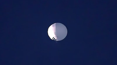 A high altitude balloon floats over Billings, Mont., on Wednesday, Feb. 1, 2023.