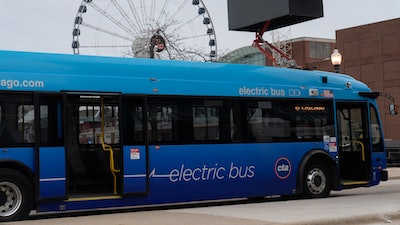 A Chicago Transit Authority electric bus charges at Navy Pier Tuesday, Feb. 14, 2023, in Chicago.
