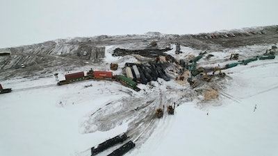 This photo provided by Joshua Henderson shows a Canadian Pacific train derailed in rural North Dakota on Sunday, March 26, 2023, which spilled hazardous materials, but local authorities and the railroad said there is no threat to public safety.