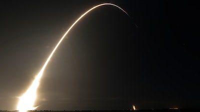 This time exposure photo shows a SpaceX Falcon 9 rocket, with a payload including two lunar rovers from Japan and the United Arab Emirates, launching from Launch Complex 40 at the Cape Canaveral Space Force Station in Cape Canaveral, Fla., on Dec. 11, 2022.