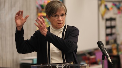 Kansas Gov. Laura Kelly answers questions from reporters during a news conference, Monday, April 24, 2023, in a second-grade classroom at Elmont Elementary School in Topeka, Kan.