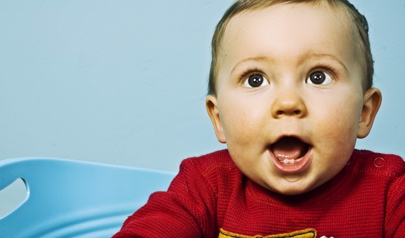 baby hitting himself on his head