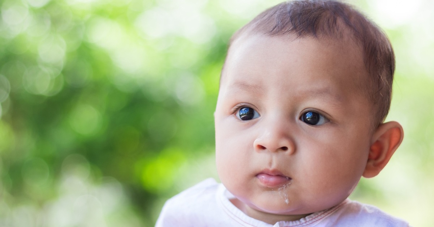 baby vomiting yellow mucus