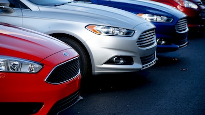 A row of new Ford Fusions are for sale on the lot at Butler County Ford in Butler, Pa., Nov. 19, 2015.