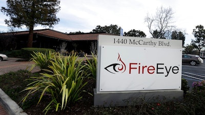 This Wednesday, Feb. 11, 2015 file photo shows FireEye offices in Milpitas, Calif. Experts say it’s going to take months to kick elite hackers widely believed to be Russian out of U.S. government networks. The hackers have been quietly rifling through those networks for months in Washington’s worst cyberespionage failure on record. FireEye is the cybersecurity company that discovered the worst-ever intrusion into U.S. agencies and was among the victims. It has already tallied dozens of casualties. It’s racing to identify more.