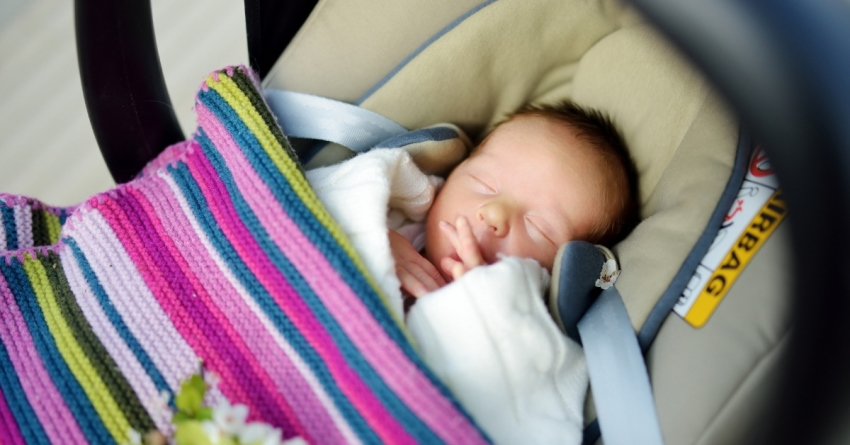 infant sleeping in car seat