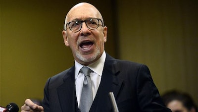 Attorney Marc Bern speaks during a press conference announcing a racketeering lawsuit targeting Gov. Rick Snyder and other state and local officials over lead contamination of the city’s drinking water, in Flint, Mich., Wednesday, Apeil 6, 2016. It accuses Snyder and others of hatching a “wrongful scheme” to reduce Flint’s indebtedness by stopping the impoverished city from buying treated Lake Huron water from Detroit, instead of “invoking time tested, well-honed federal bankruptcy protections for restructuring the debts of municipalities.”