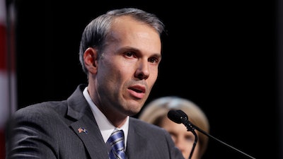 Mark Totten, Democratic candidate for Michigan attorney general, gives his concession speech during an election night rally in Detroit, Nov. 4, 2014.