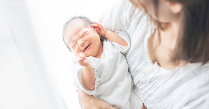 newborn throwing up after drinking formula