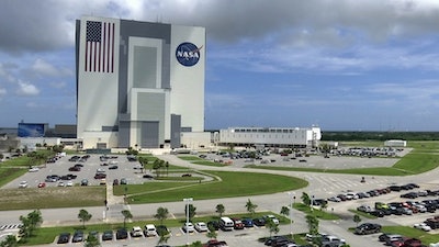 This July 14, 2017, photo shows the Vehicle Assembly Building at NASAs Kennedy Space Center in Cape Canaveral, Florida in Cape Canaveral, Fla. NASA says it may soon have the capability to send astronauts to the International Space Station from U.S. soil for the first time since the retirement of the space shuttle in 2011.
