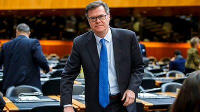 Dennis Shea, US Ambassador to the WTO, arrives for the opening of the General Council, at the headquarters of the World Trade Organization, WTO, in Geneva, Switzerland, Monday, Dec. 9, 2019.